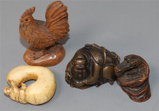 Four Japanese netsuke: one bronze, a cockerel, a dragon and figure on a gourd